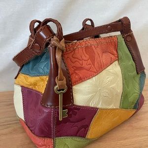 Fossil women’s multi-color patch leather handbag.